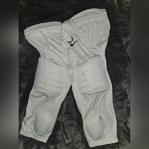 Nike dri-fit padded football pants Size XL.